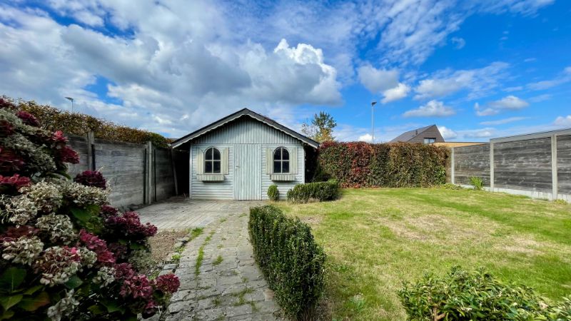 Charmante woning met garage en tuin foto 22