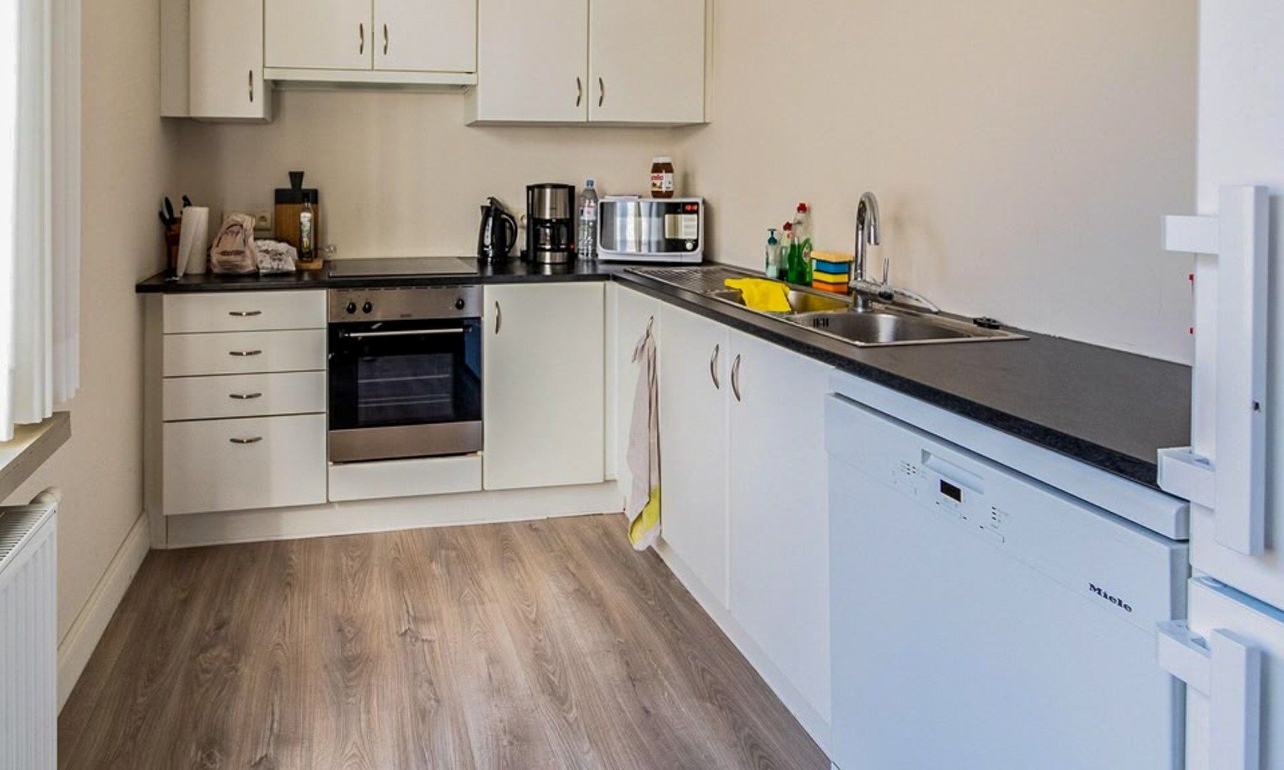 Instapklare, gemeubelde rijwoning met 3 verdiepingen te huur in Oostende foto 6