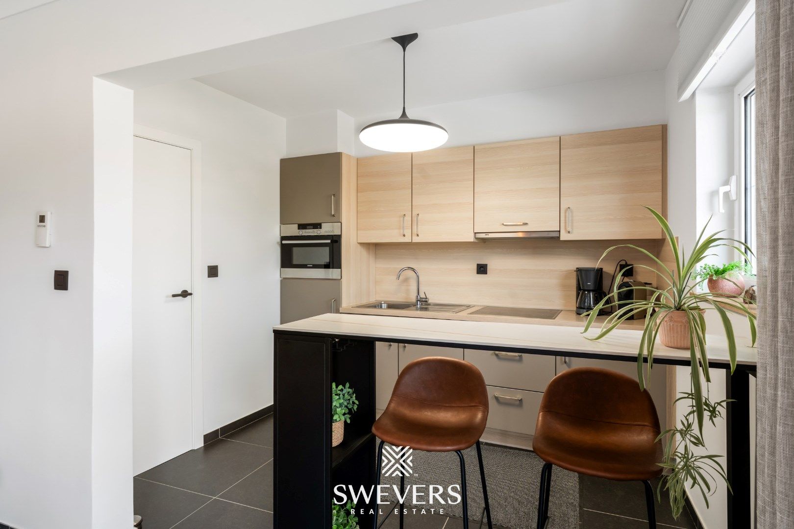 Comfortabel wonen met ruim Terras, 2 Slaapkamers, parkeerkelder & berging foto 14