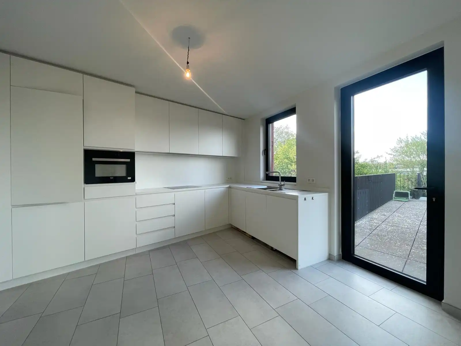 Duplex app met 3 slpks en tuin foto 6