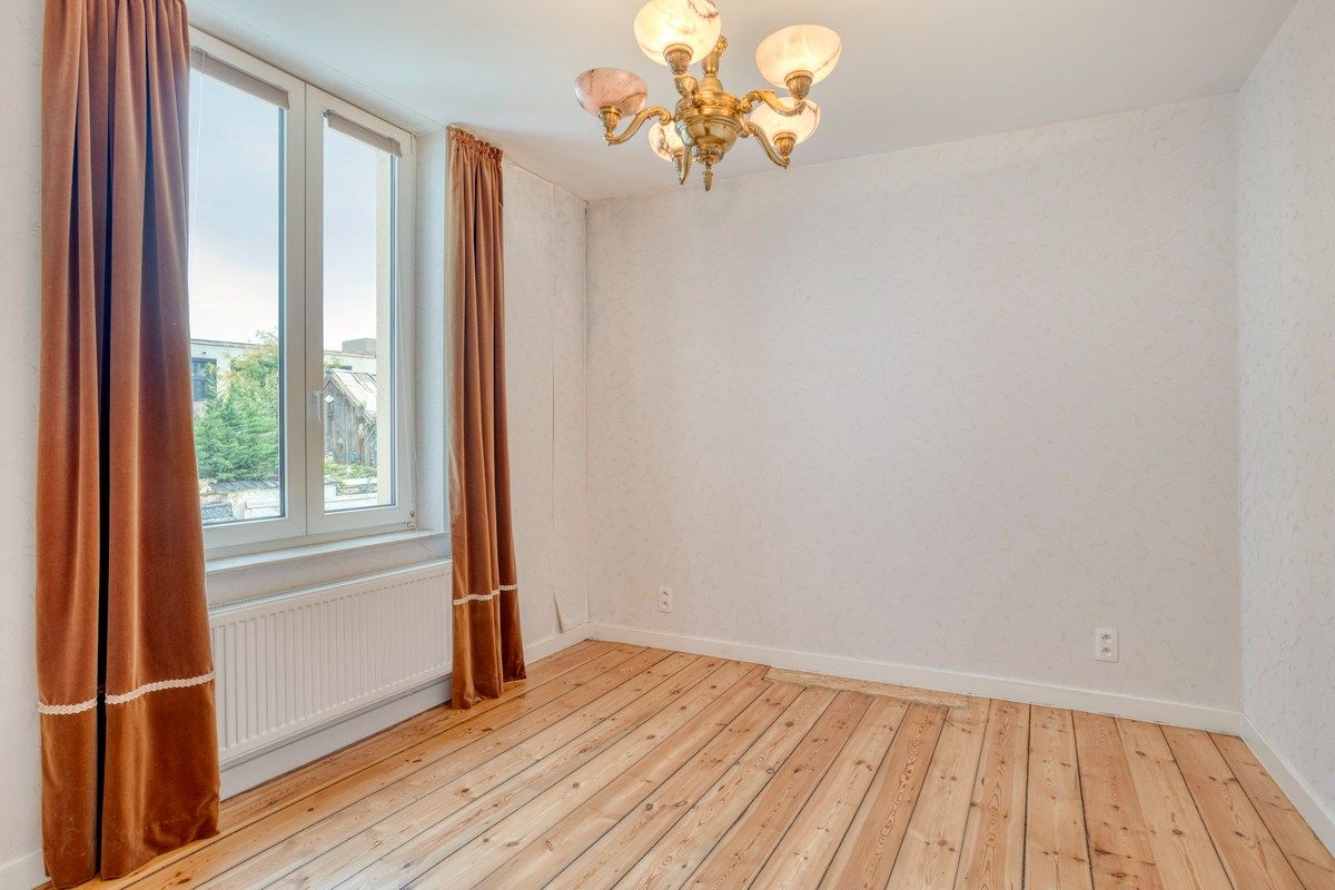 Ruim en gerenoveerd burgerwoning met stadstuin in het hart van Halle foto 11