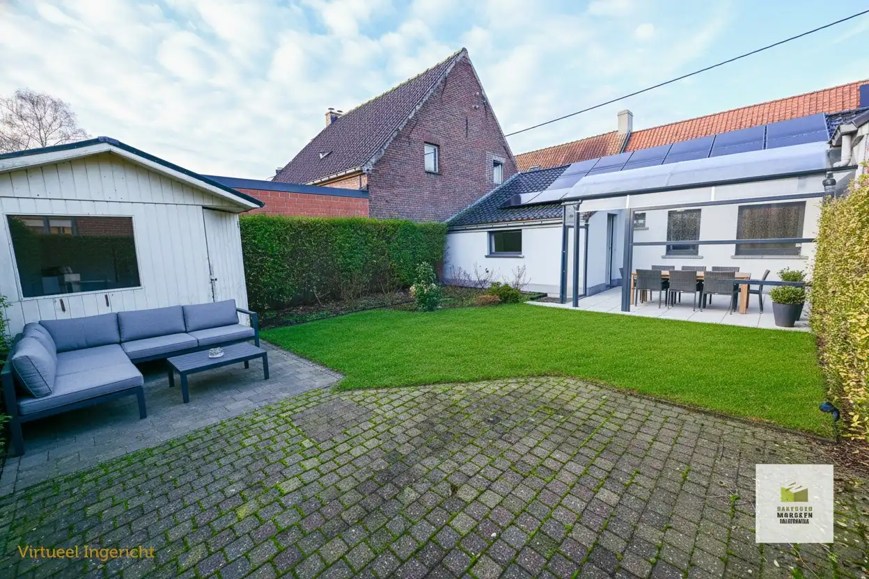 Centraal gelegen woning met 2 slaapkamers, tuin en garage foto 17