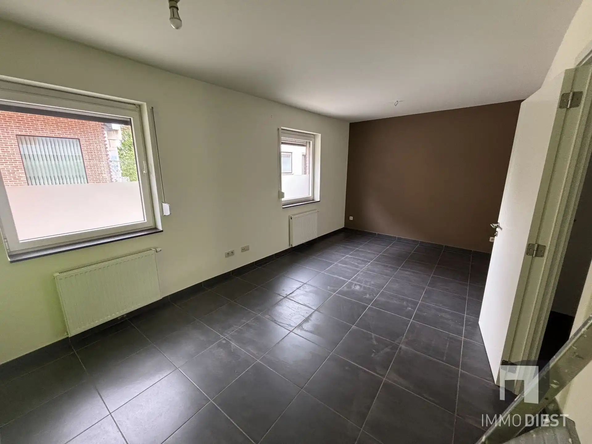 Energiezuinig appartement in centrum met kelder en garagebox foto 21