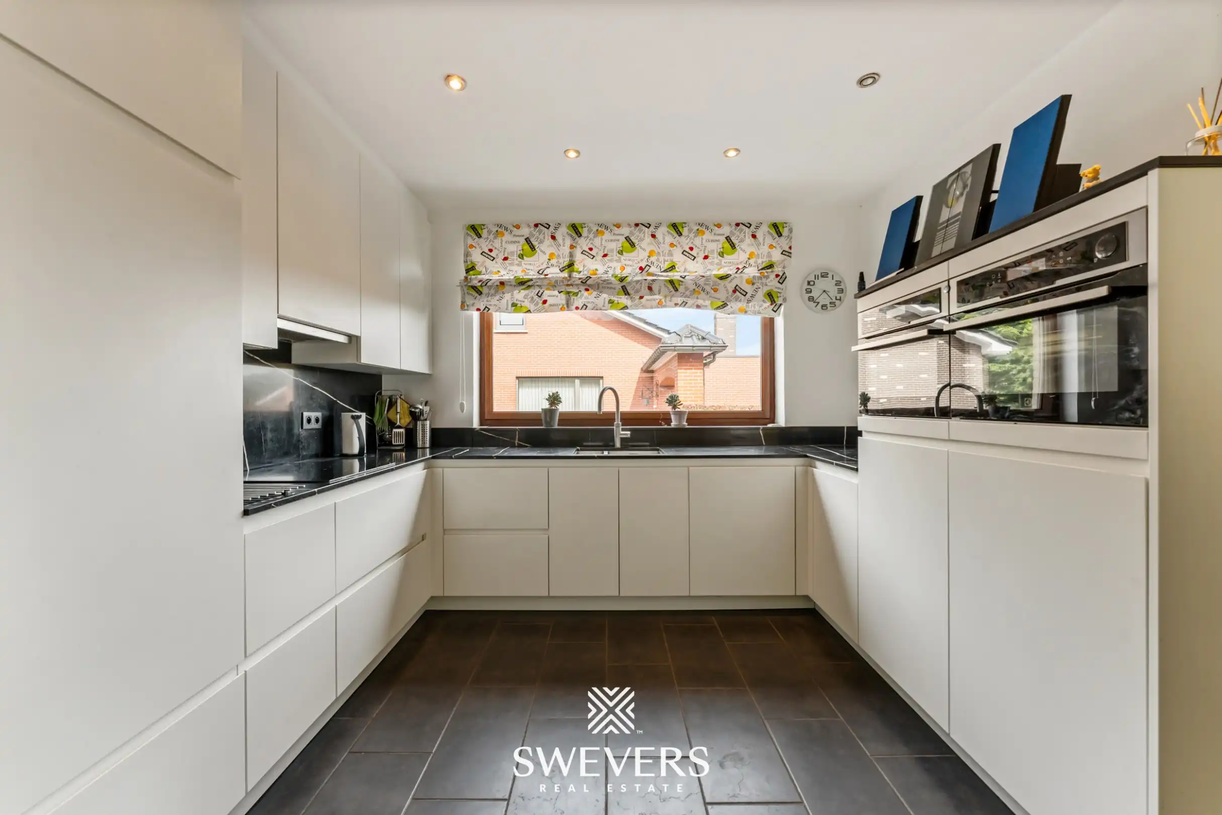 Uitzonderlijk ruime kangoeroewoning met 7 slpk te Hasselt foto 4