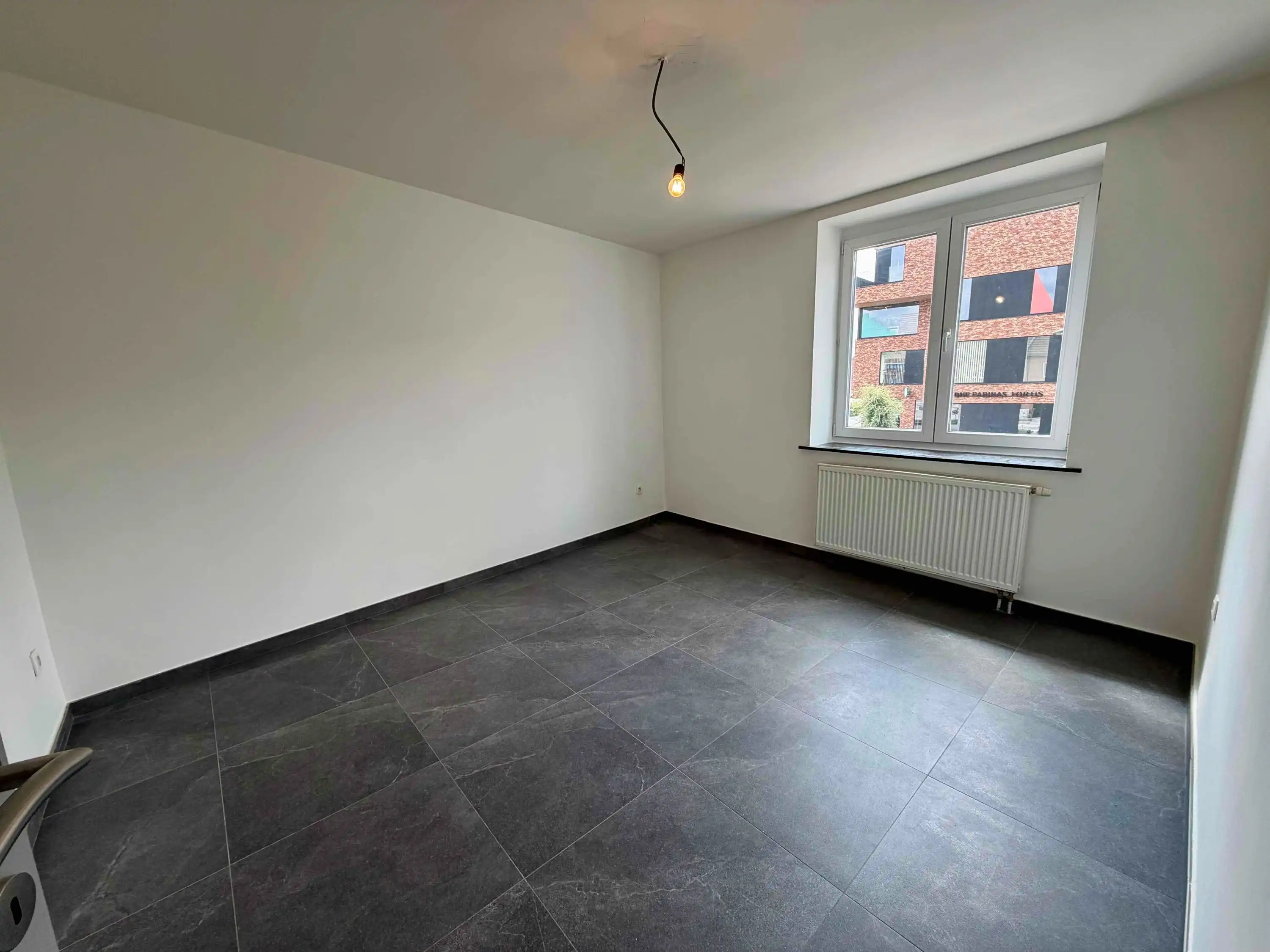 Gerenoveerd handelspand met instapklaar duplexappartement en tuintje foto 11