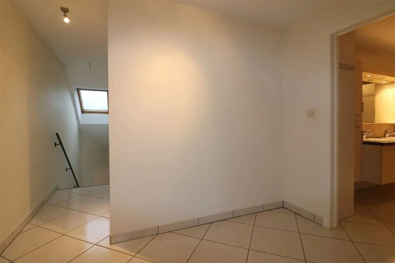 Duplex met 3 slpk., ruim terras en garage nabij station foto 14