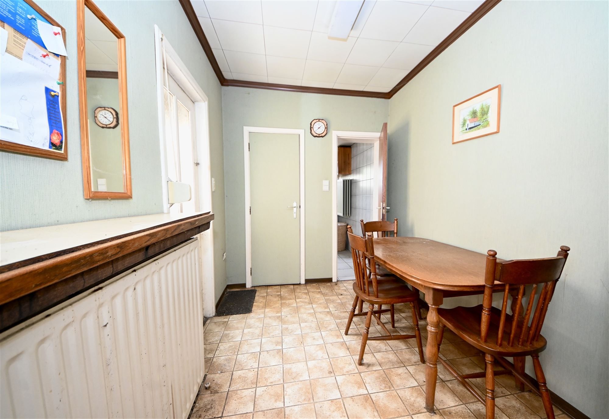 Te renoveren woning met 2 (mogelijk 3) slaapkamers en tuin. foto 9