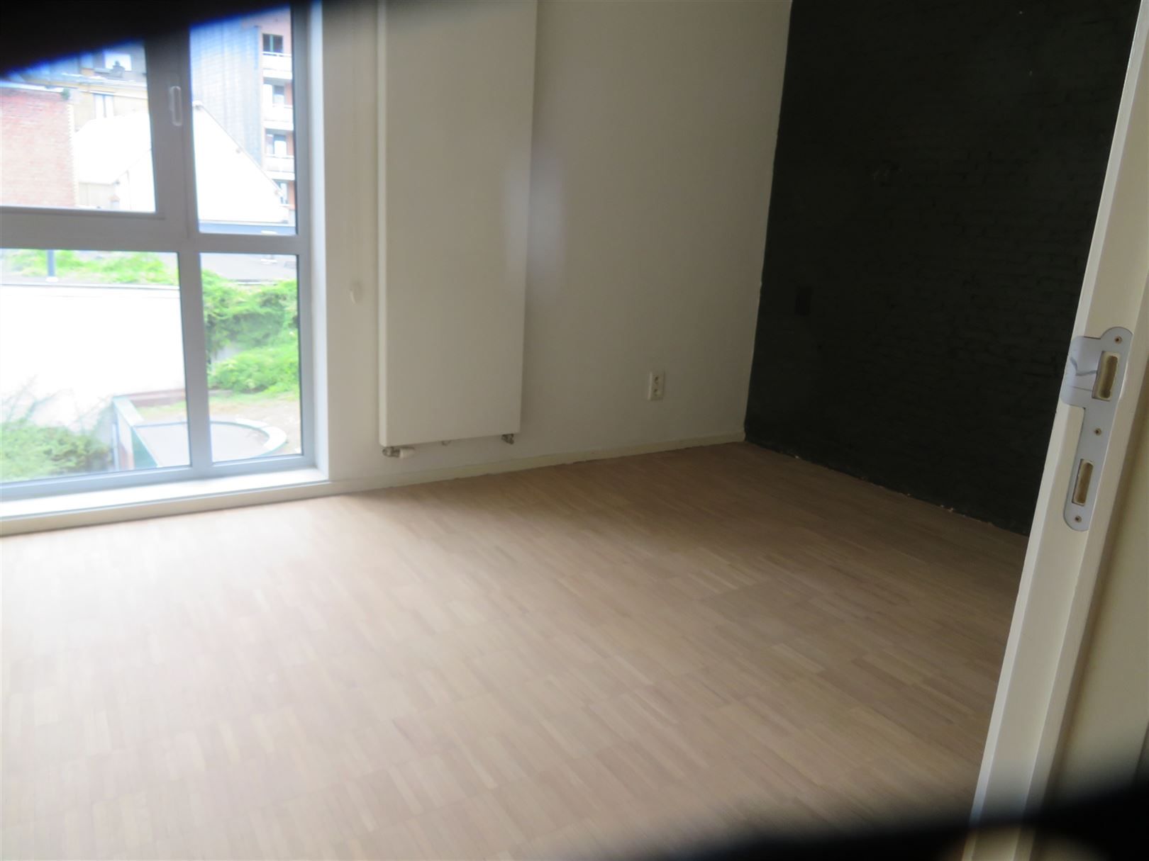 Loft appartement met één slaapkamer in hartje Antwerpen, zijstraat van de Meir! foto 14