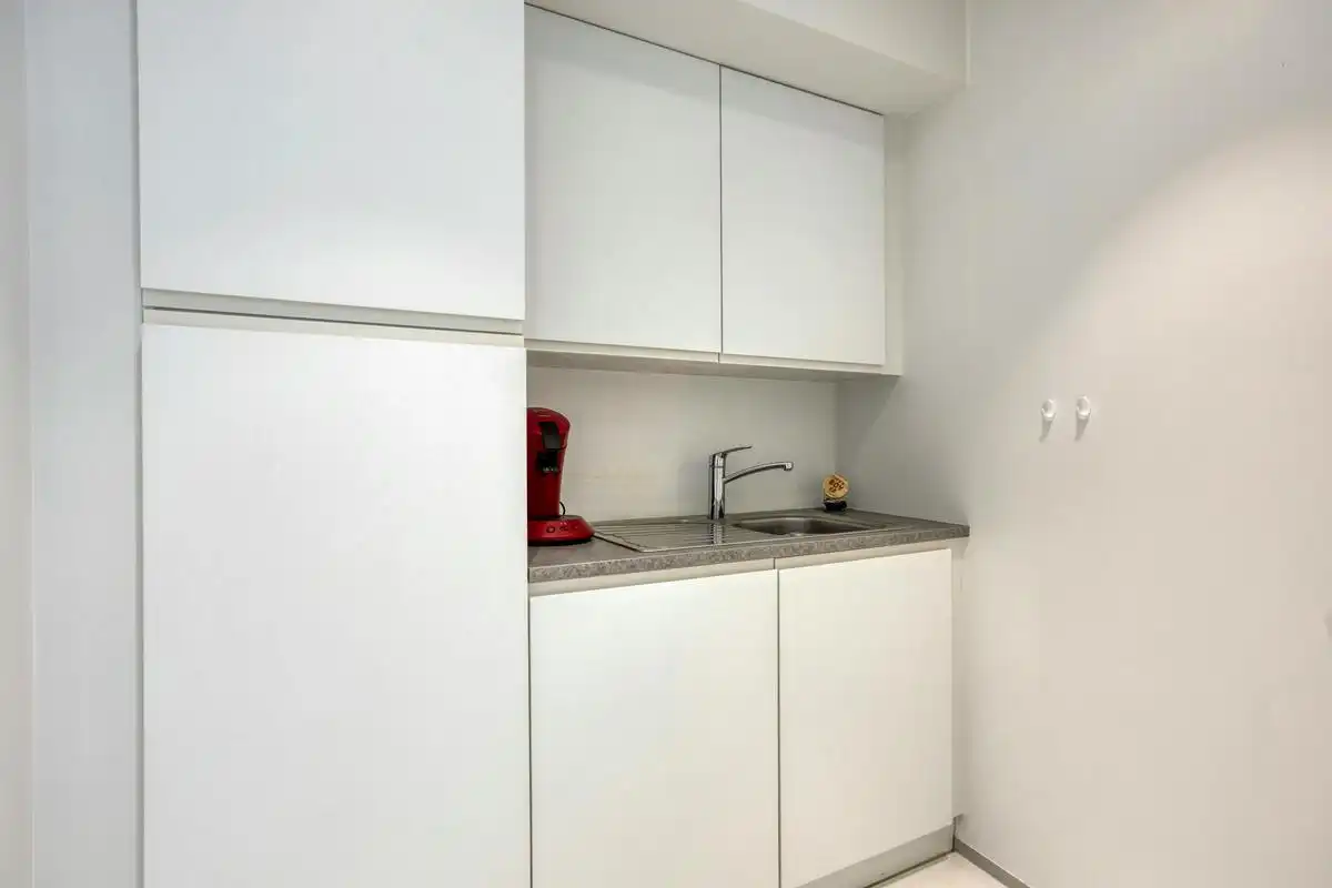 Verhuurde opbrengsteigendom met handelsruimte en duplex  foto 10