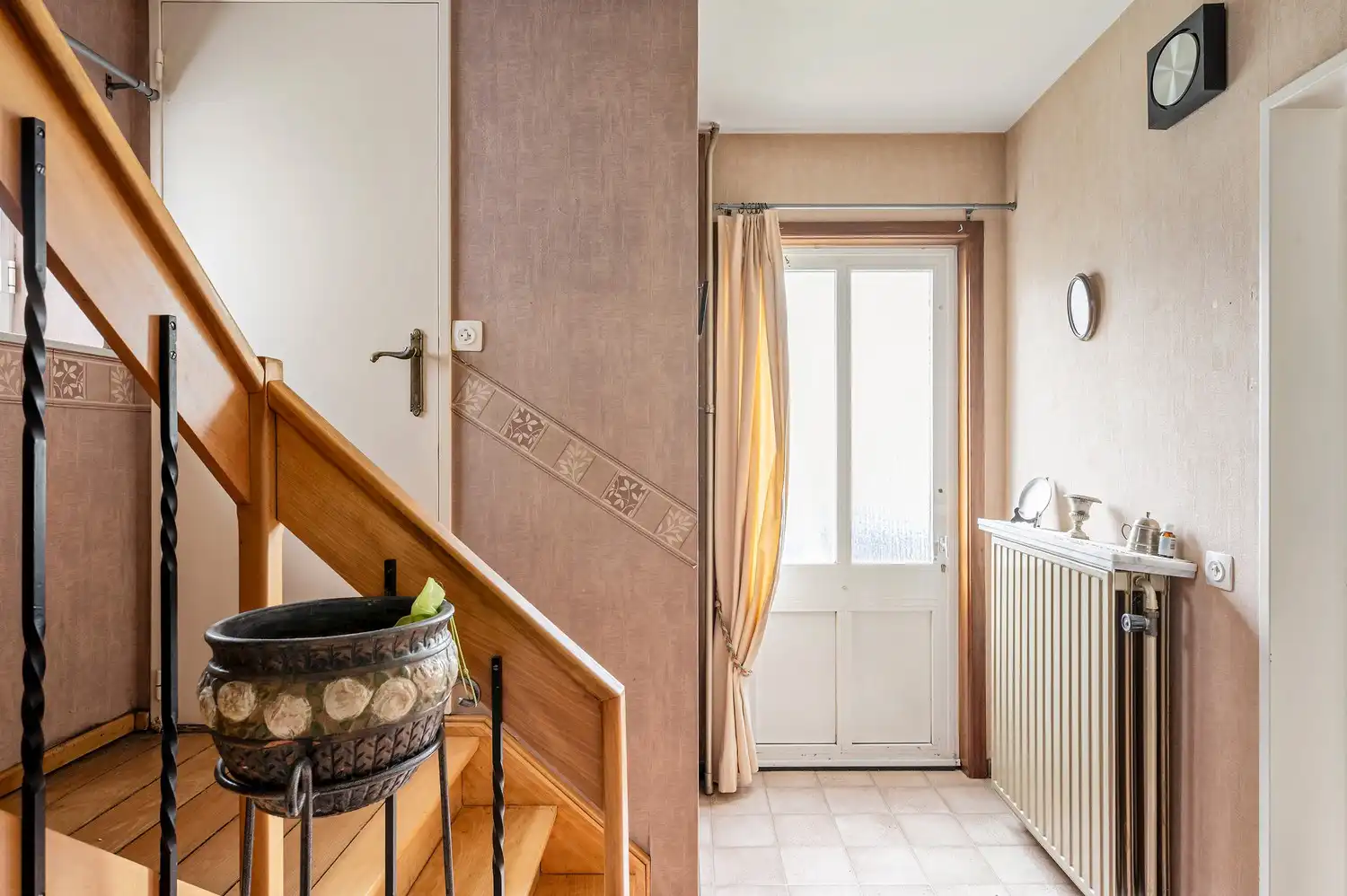 Charmante gezinswoning met 3 slaapkamers, veranda en tuin. foto 4