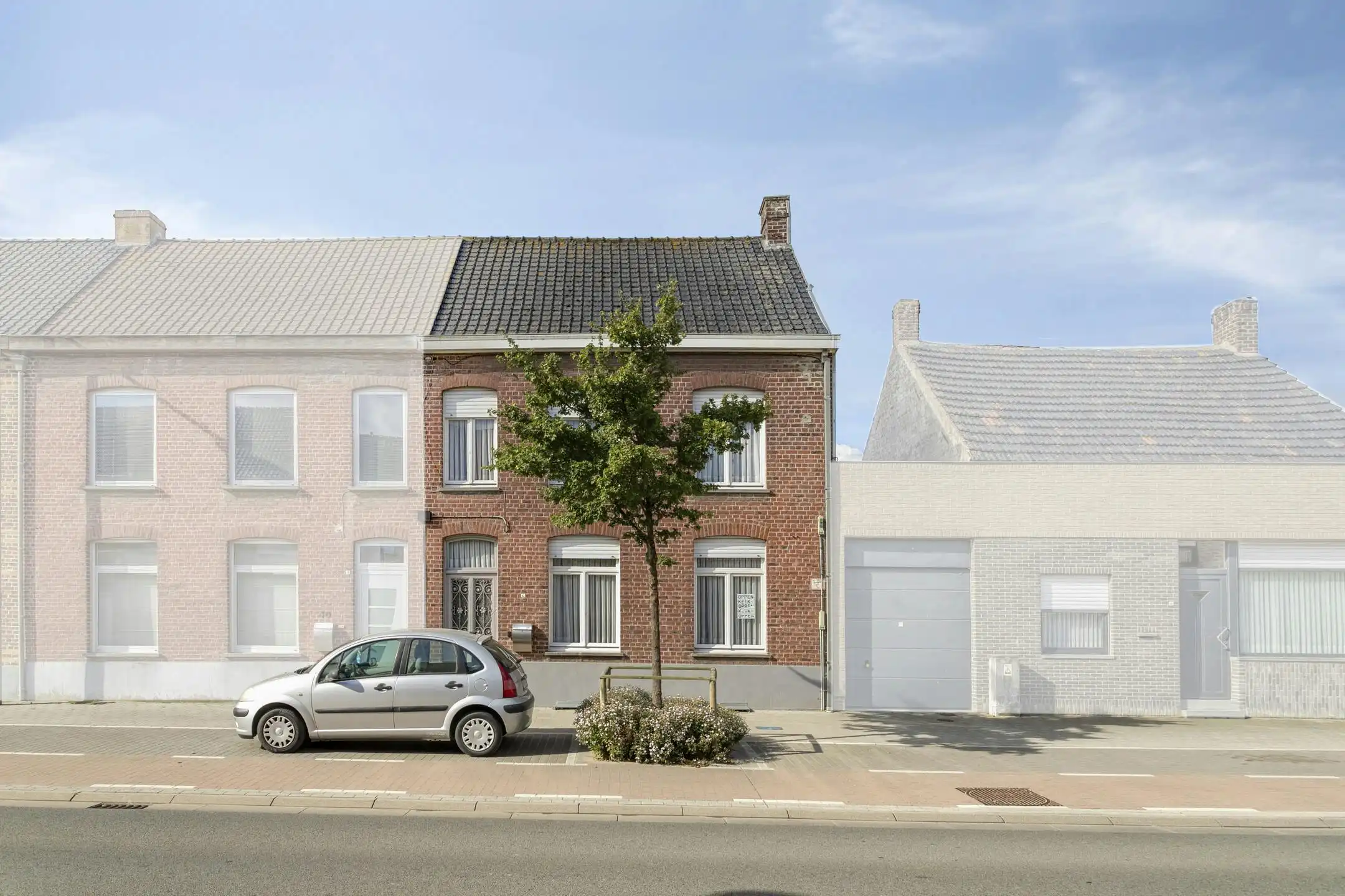 Karaktervol huis met zonnige tuin, 3 slaapkamers én garage met uitweg foto 4