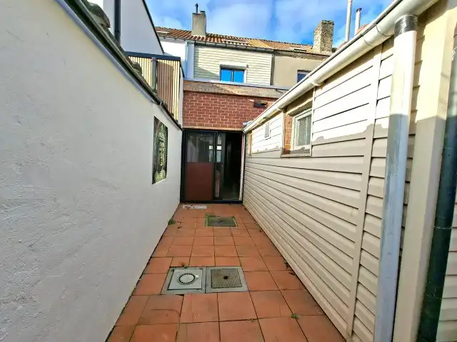 Toffe rijwoning met uitweg foto 7