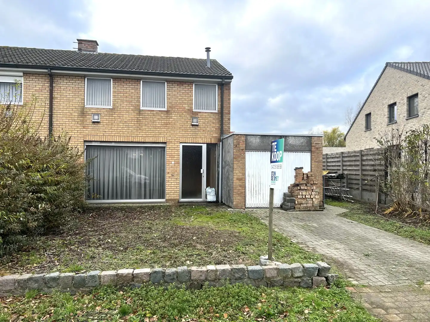 Halfopen woning met zonnige tuin foto 9