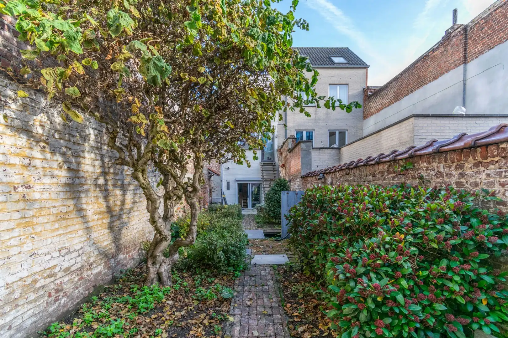 Karaktervol hoogwaardig afgewerkt gebouw met winkelruimte en woonst  foto 16