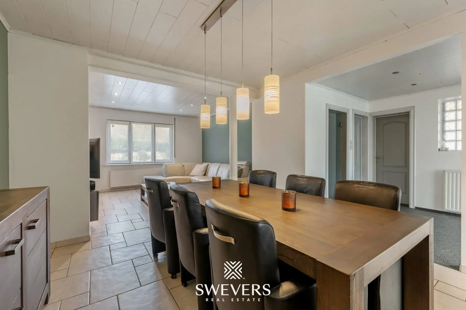 Ruime halfopen woning met zuidoostgerichte tuin en zwembad foto 10