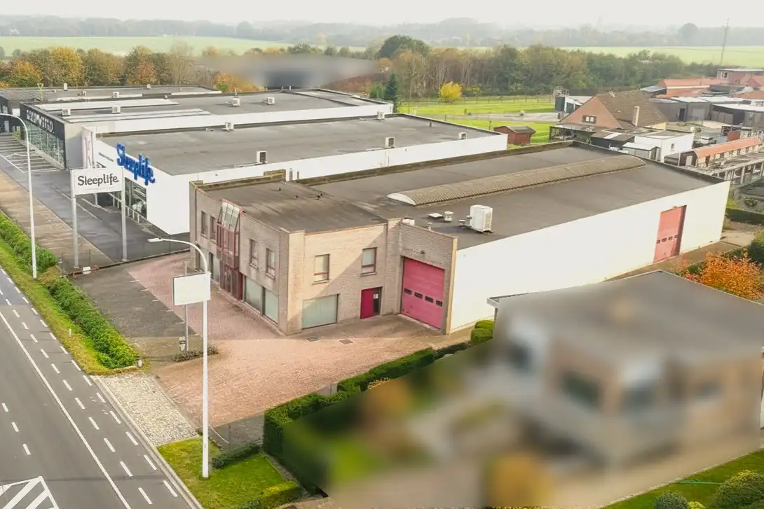  veelzijdig bedrijfsgebouw met woonst op een absolute commerciële topligging foto 4