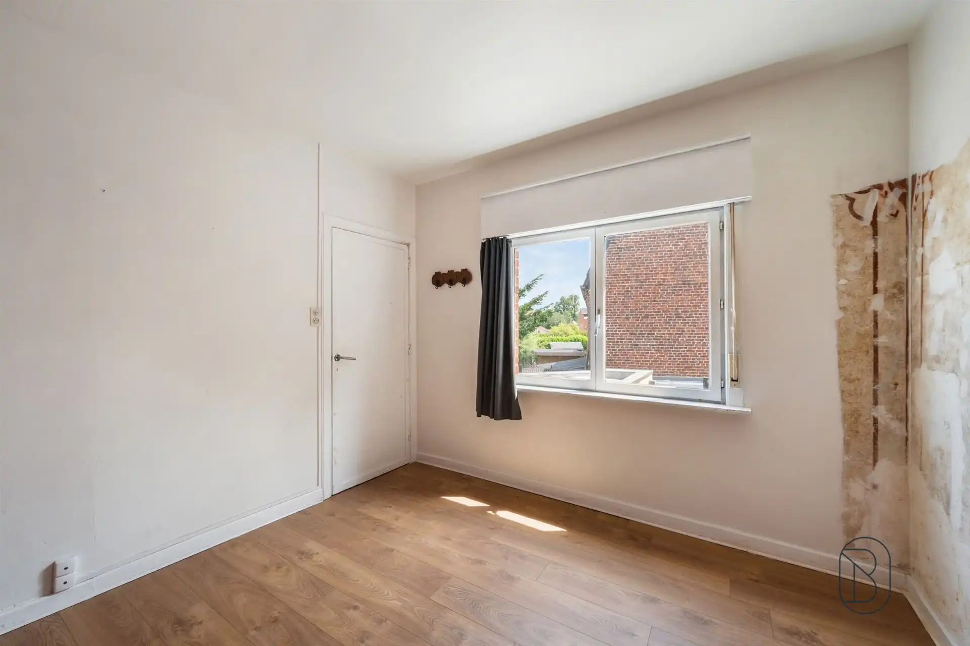 Te renoveren woning met 3 SLK, stadstuin en veel potentieel foto 14