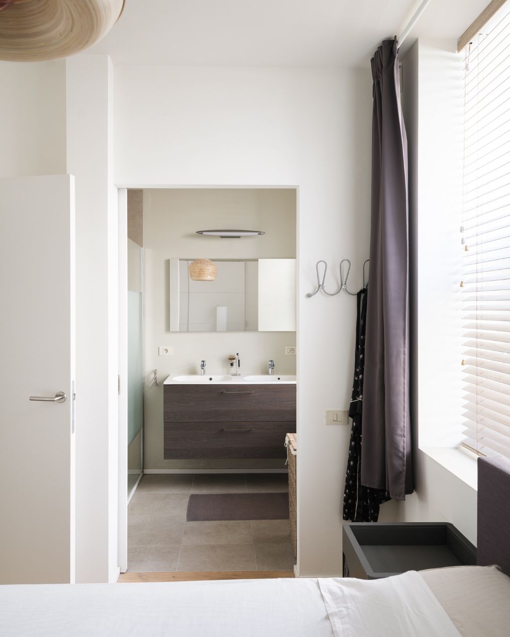 Hedendaags gelijkvloers appartement met één slaapkamer en stadstuin, gelegen in de voormalige brandweerkazerne en de vroegere kunstacademie, midden in het historisch hart van Gent. foto 19