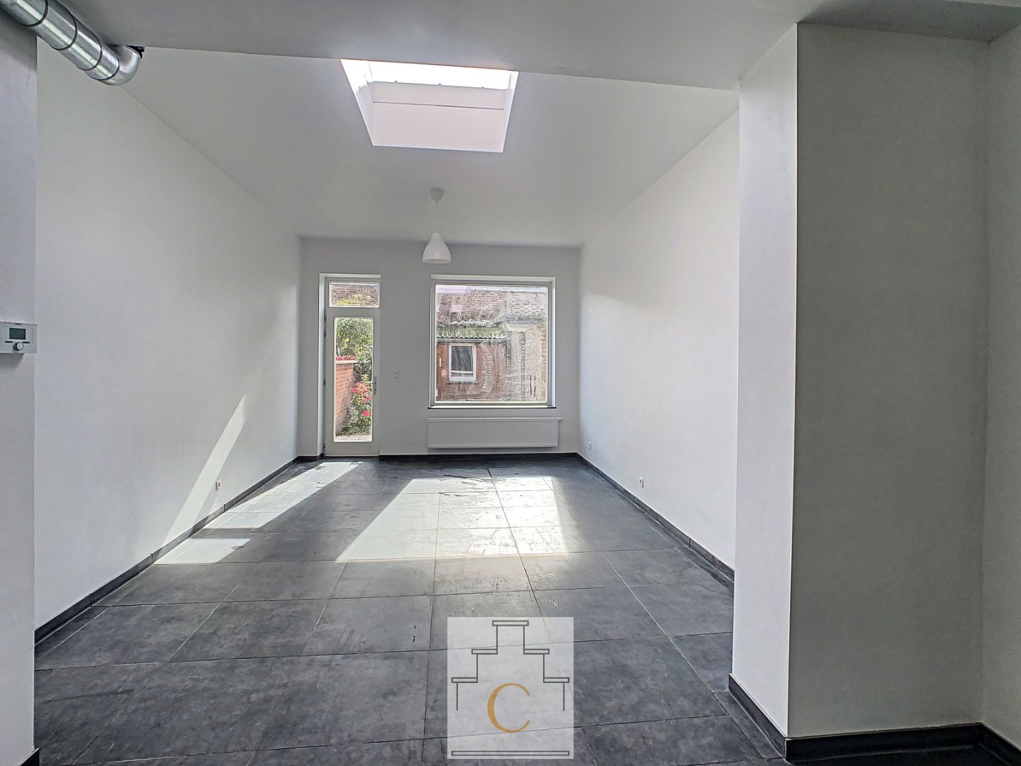 gerenoveerde rijwoning met zuidgerichte tuin voorraan St Andries foto 6