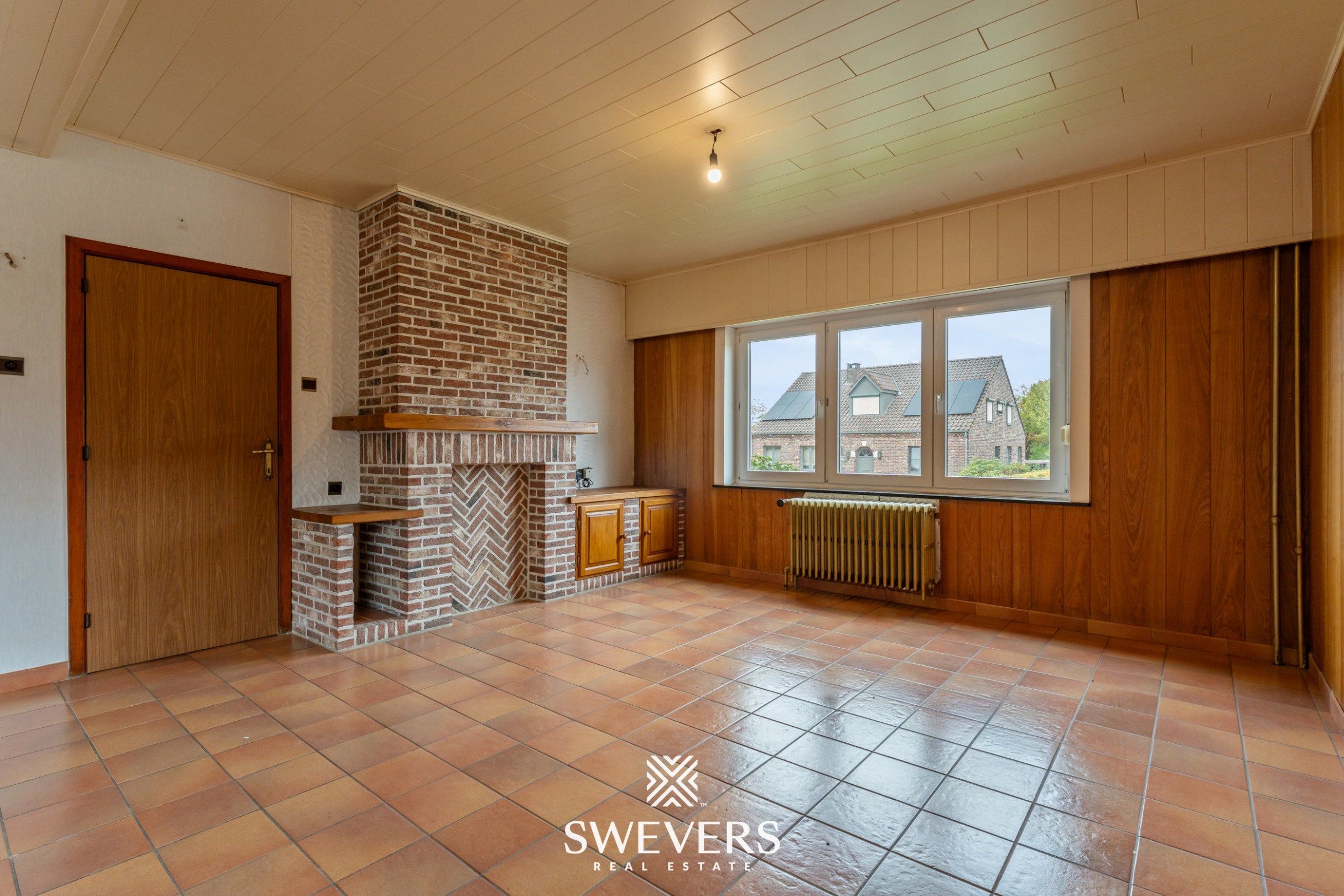 Ruime open bebouwing met potentieel en zuidgerichte tuin in rustige wijk van Houthalen foto 2