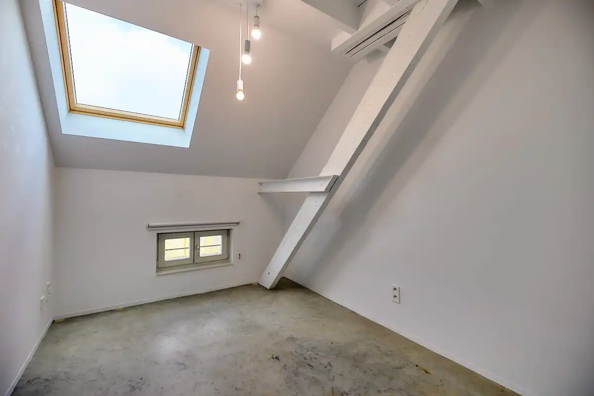 Exceptioneel en luxueus gerenoveerd 19e eeuws duplex dakappartement midden in de binnenstad. foto 19