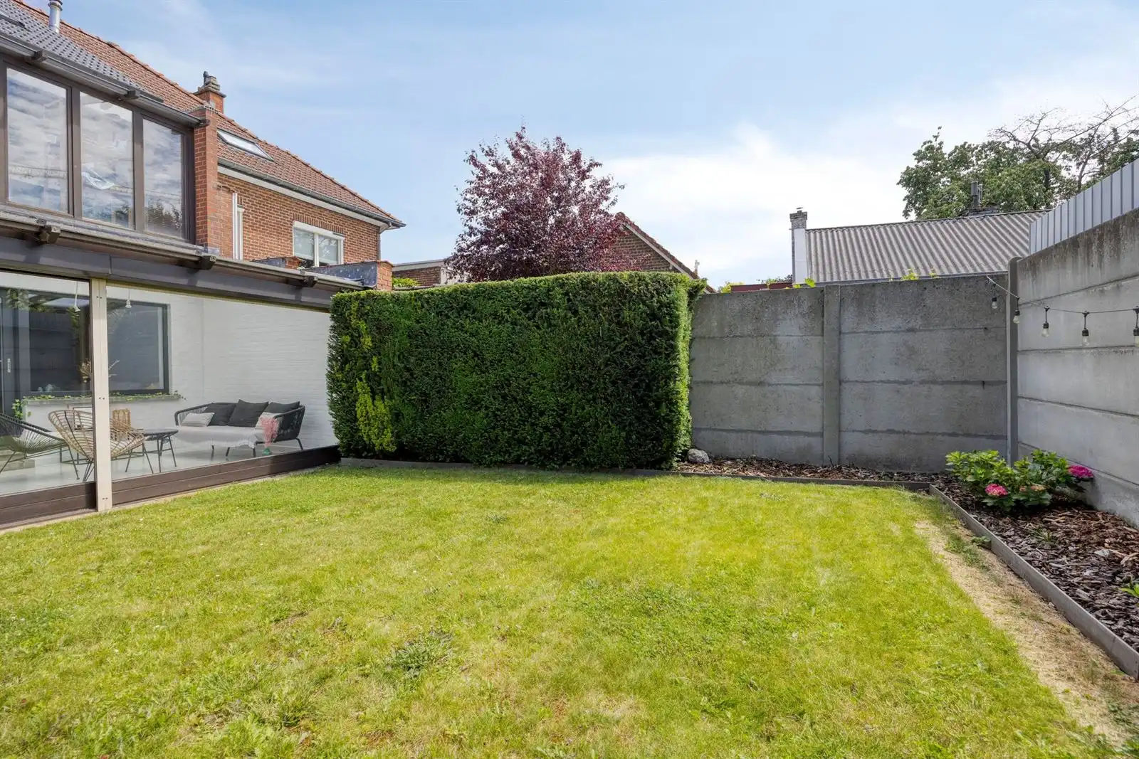 Instapklaar gelijkvloers appartement met 2 slaapkamers, garage en zonnige tuin foto 21