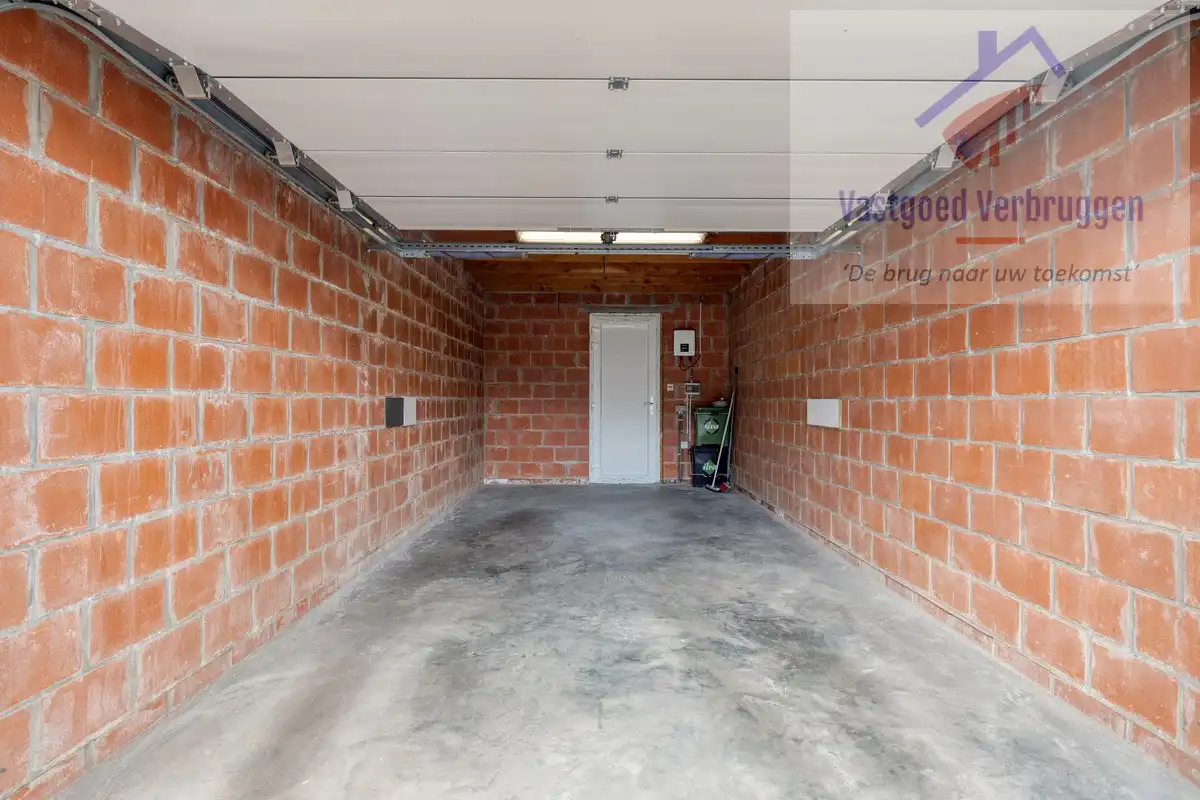 Modern recent gelijkvloers appartement met zuidgericht terras, zonnepanelen en garagebox in hartje Nieuwerkerken foto 12