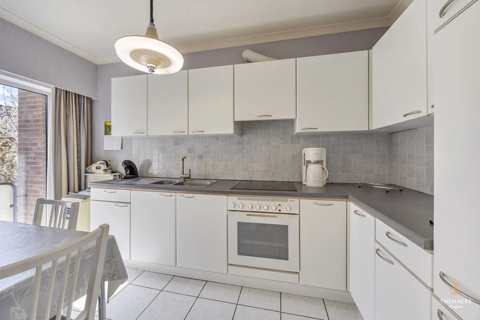 Rustig gelegen appartement met 2 slaapkamers en 2 terrassen nabij het dorpsplein van Brustem. foto 8