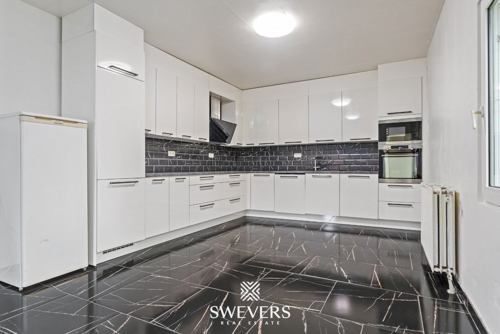 Instapklare, recent gerenoveerde gezinswoning in Beverlo foto 8