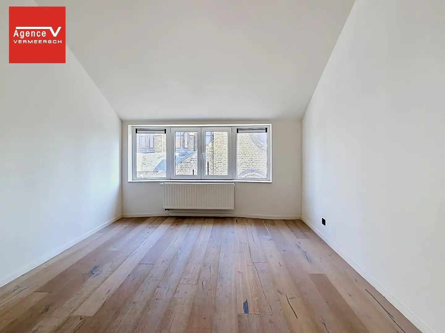 Instapklaar 3-slaapkamerappartement aan het Heilig-Hartplein. foto 16