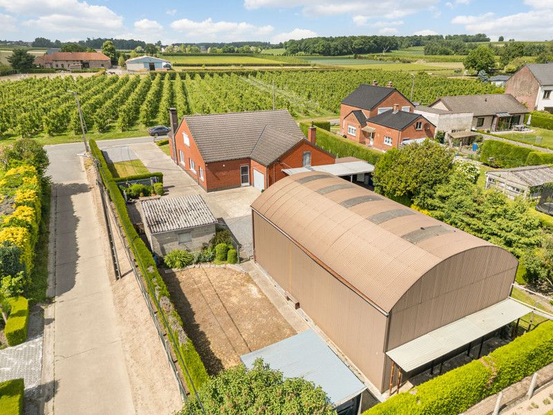 Ruime woning met loods op een perceel van 14are foto 40