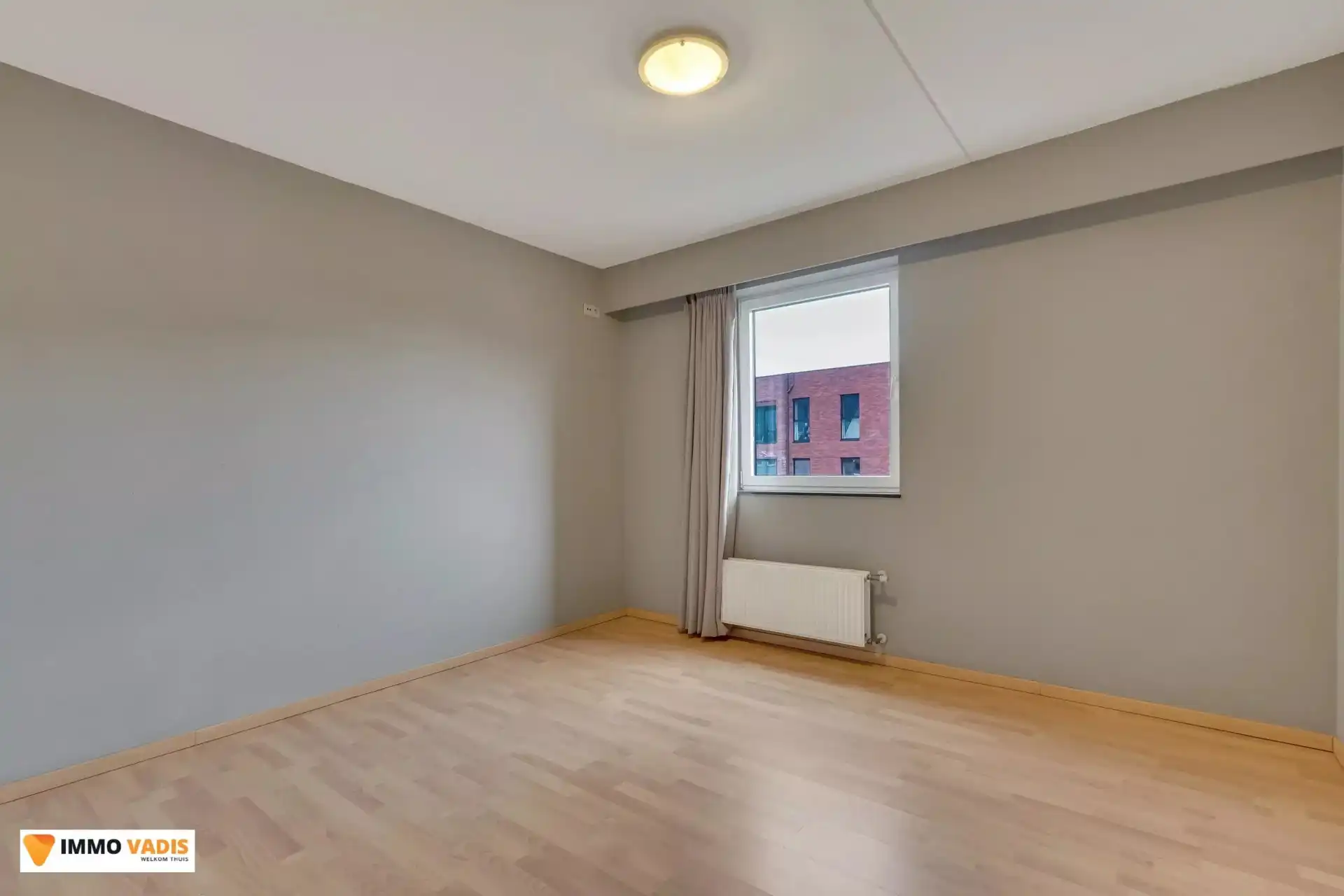 Goed onderhouden appartement met twee slaapkamers, terras en afgesloten parkeerplaats foto 8