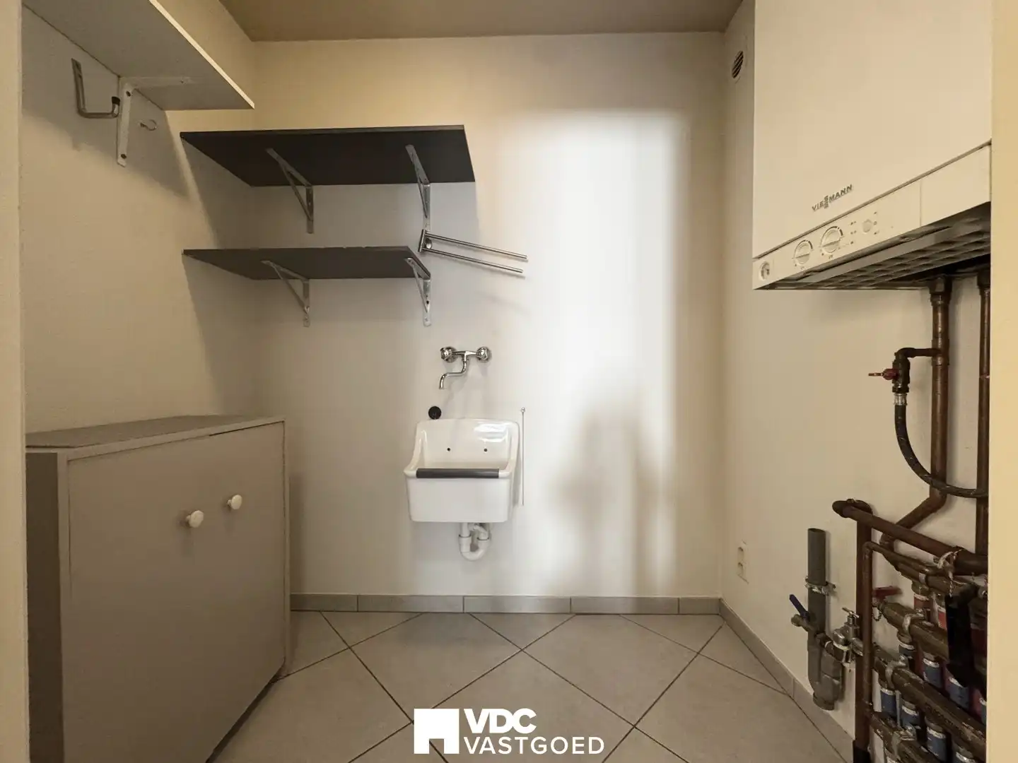 Appartement met twee slaapkamers en garage in hartje Borgloon foto 10