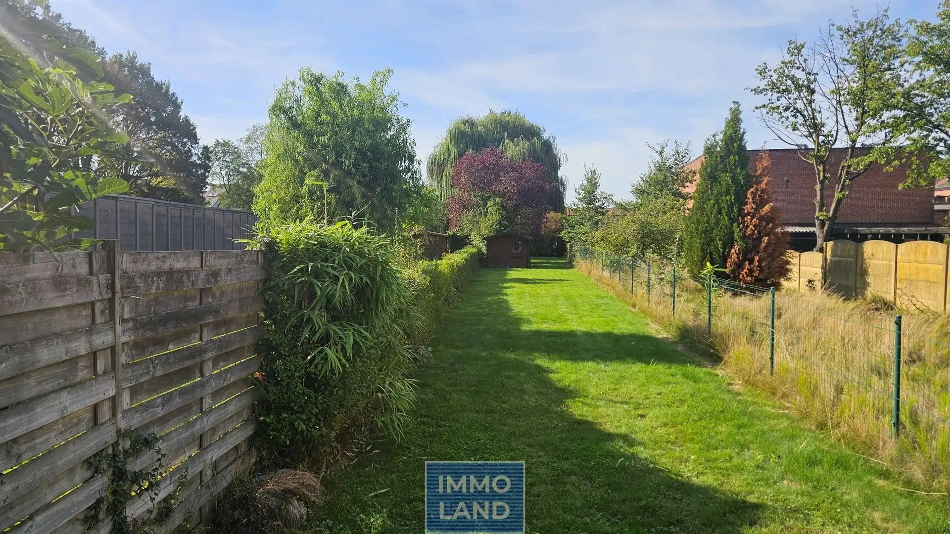 Charmante rijwoning met diepe zuid gerichte tuin in Hasselt. foto 5