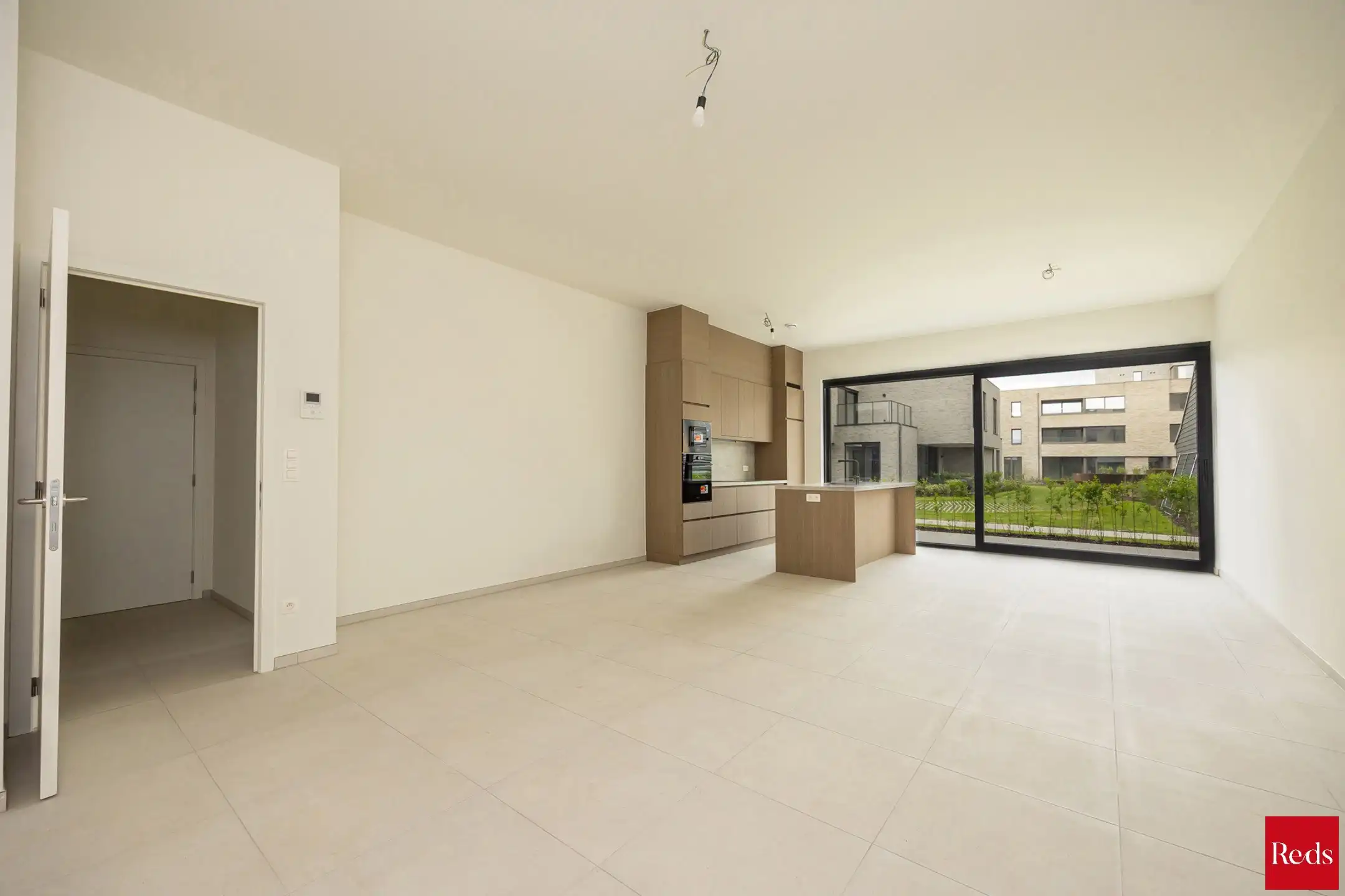 Ruim gelijkvloers nieuwbouwappartement met 3 slaapkamers foto 8