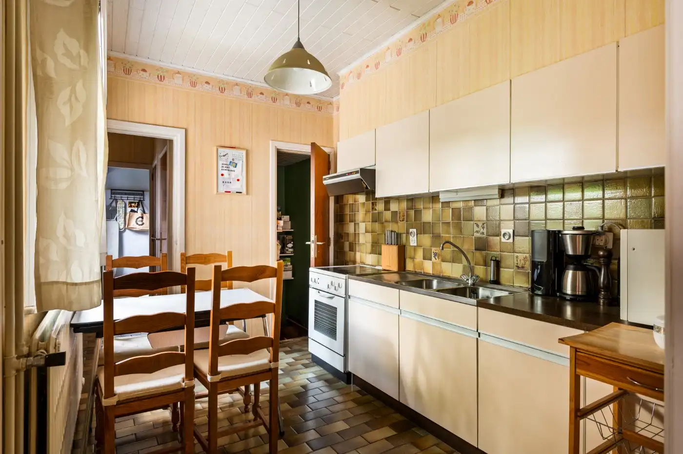 Te renoveren woning met 3 slpk., garage en tuintje foto 9