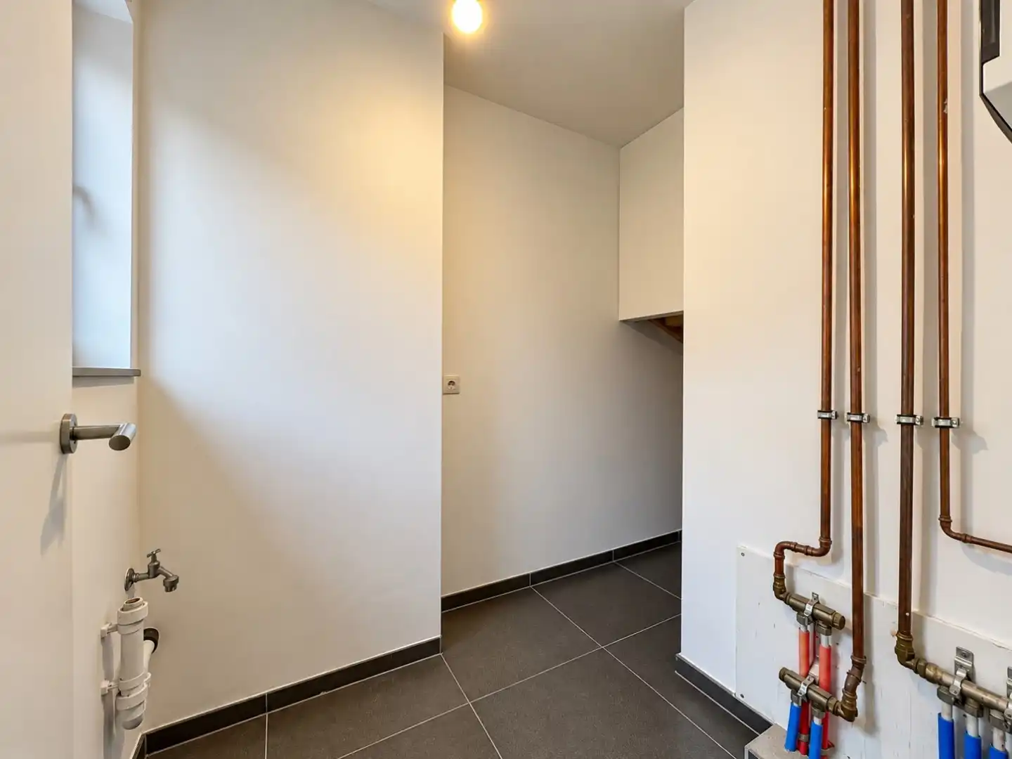 Ruim en instapklaar duplexappartement met 3 slaapkamers en garage in hartje Waarschoot foto 10