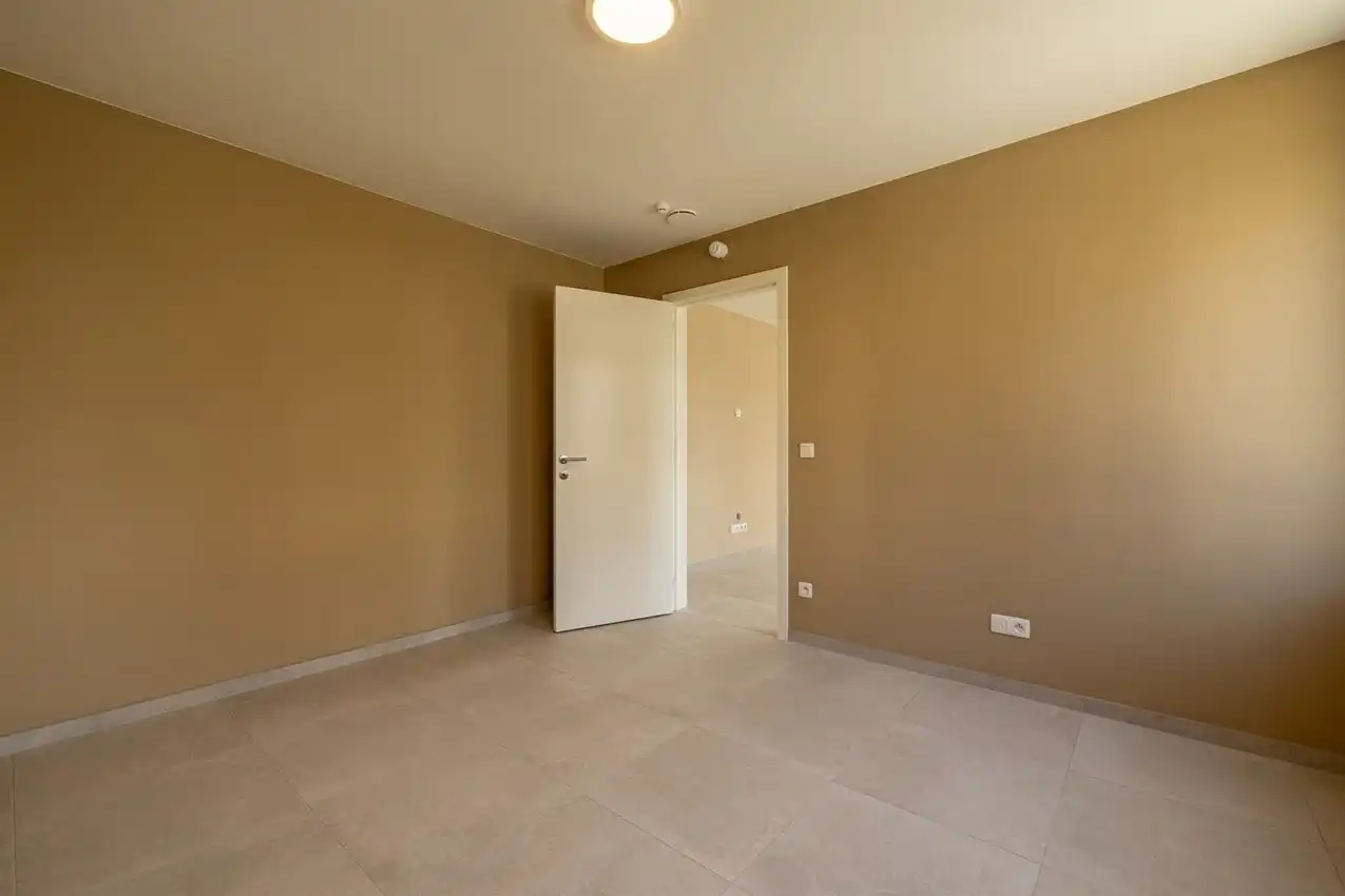 Gelijkvloers app. met twee slaapkamers, zuidterras, garage nabij bossen foto 15