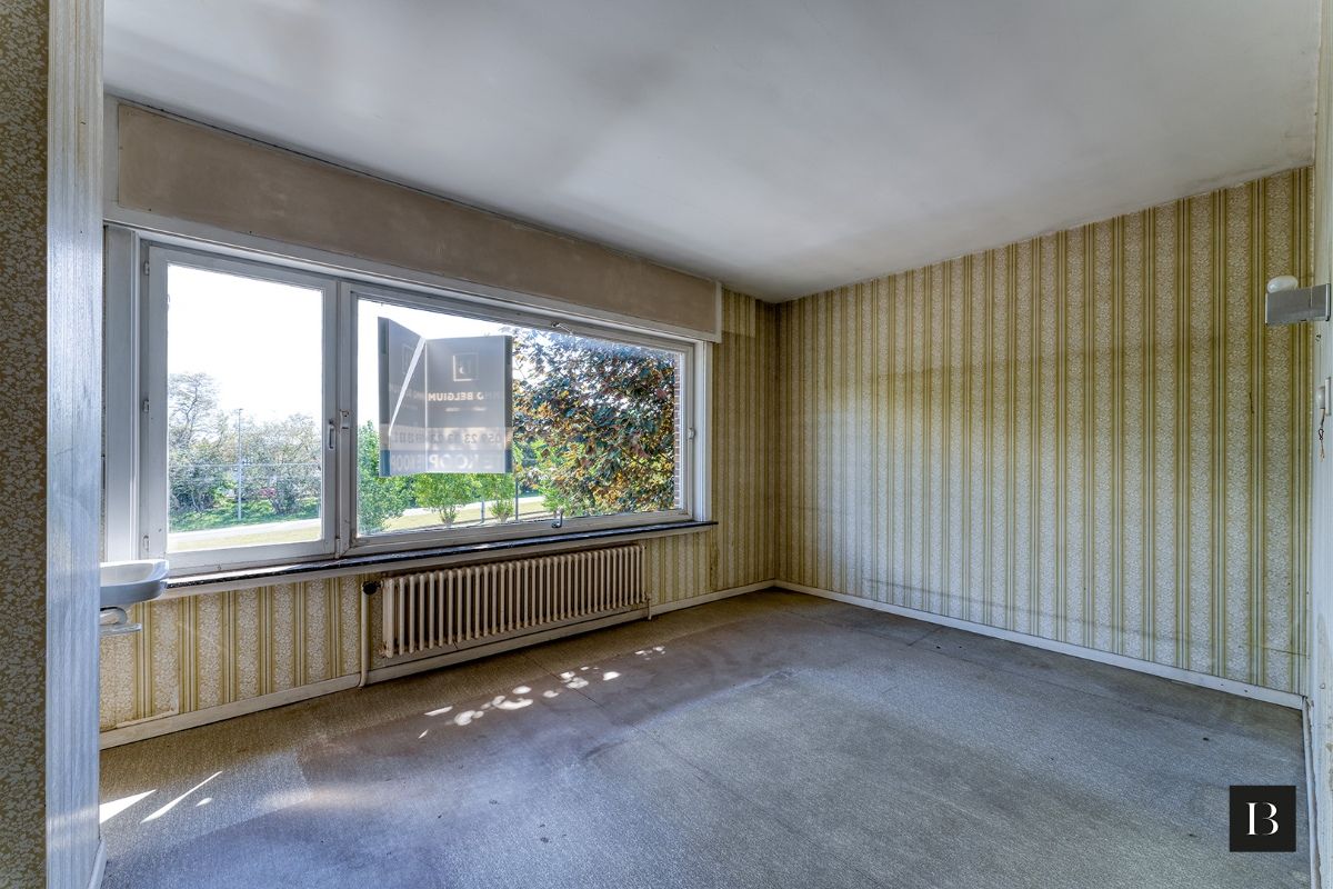 Te renoveren halfopen woning in de Concessie foto 10