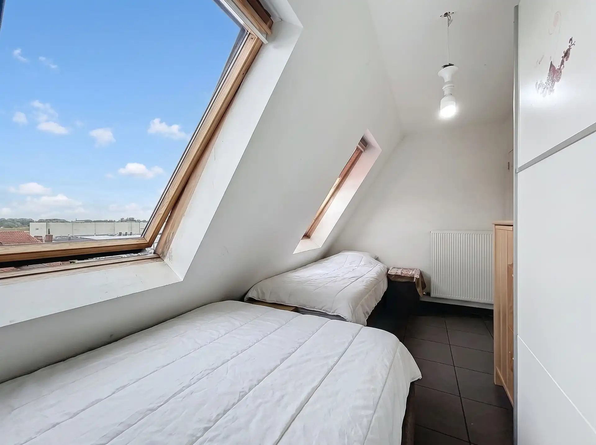 Recent 3-slaapkamer appartement met staanplaats op centrale ligging! foto 6