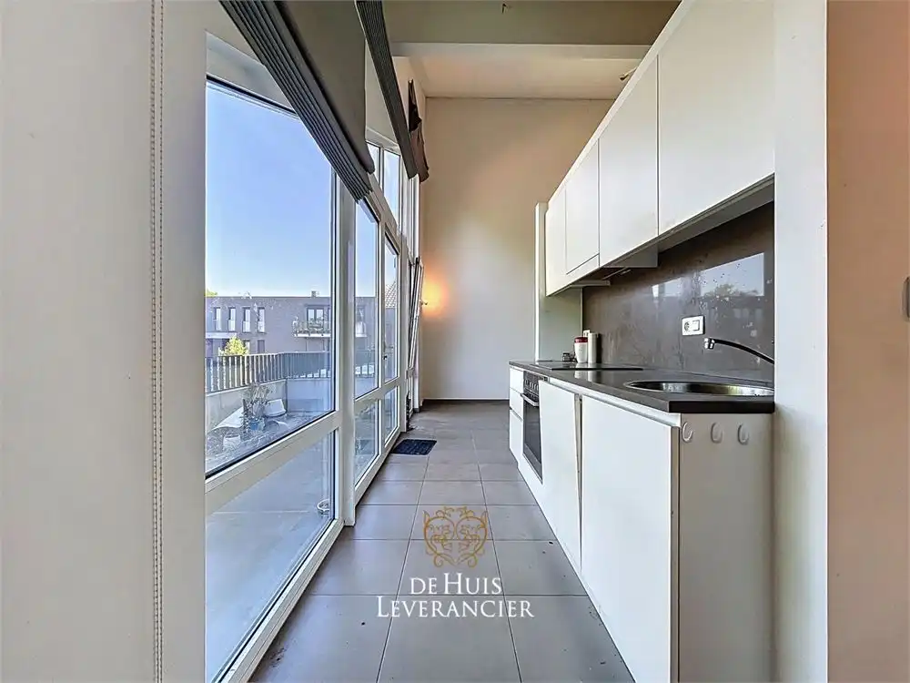 Luxueuze serviceflat met 1 slk en ruim terras foto 13
