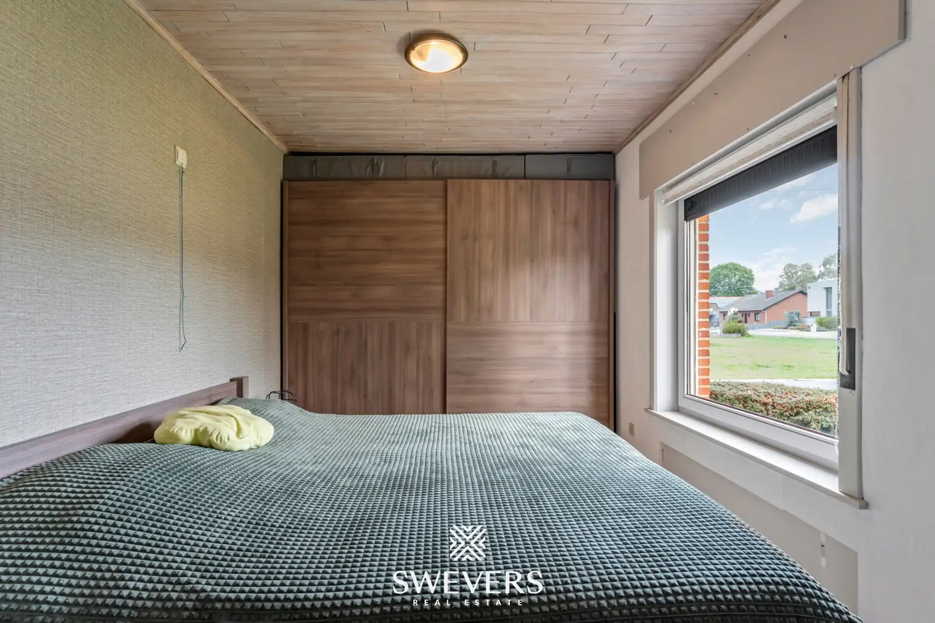 Gelijkvloerse, instapklare woning met grote tuin op rustige locatie te Koersel foto 11