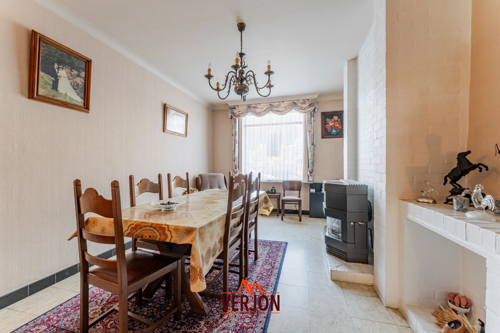 Charmante woning met ruime tuin te koop op het dorpsplein in Kachtem! foto 5