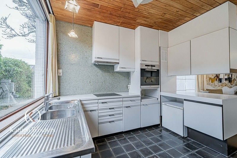 Organische architecten- en kunstenaarswoning foto 12