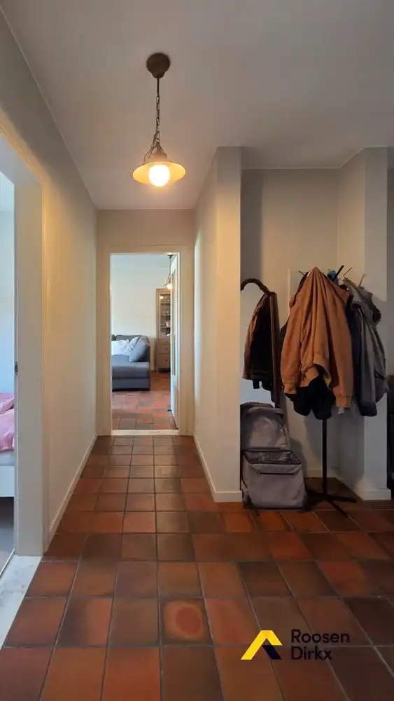 Verzorgd tweeslaapkamerappartement met parkeerplaats in centrum Bree. foto 10