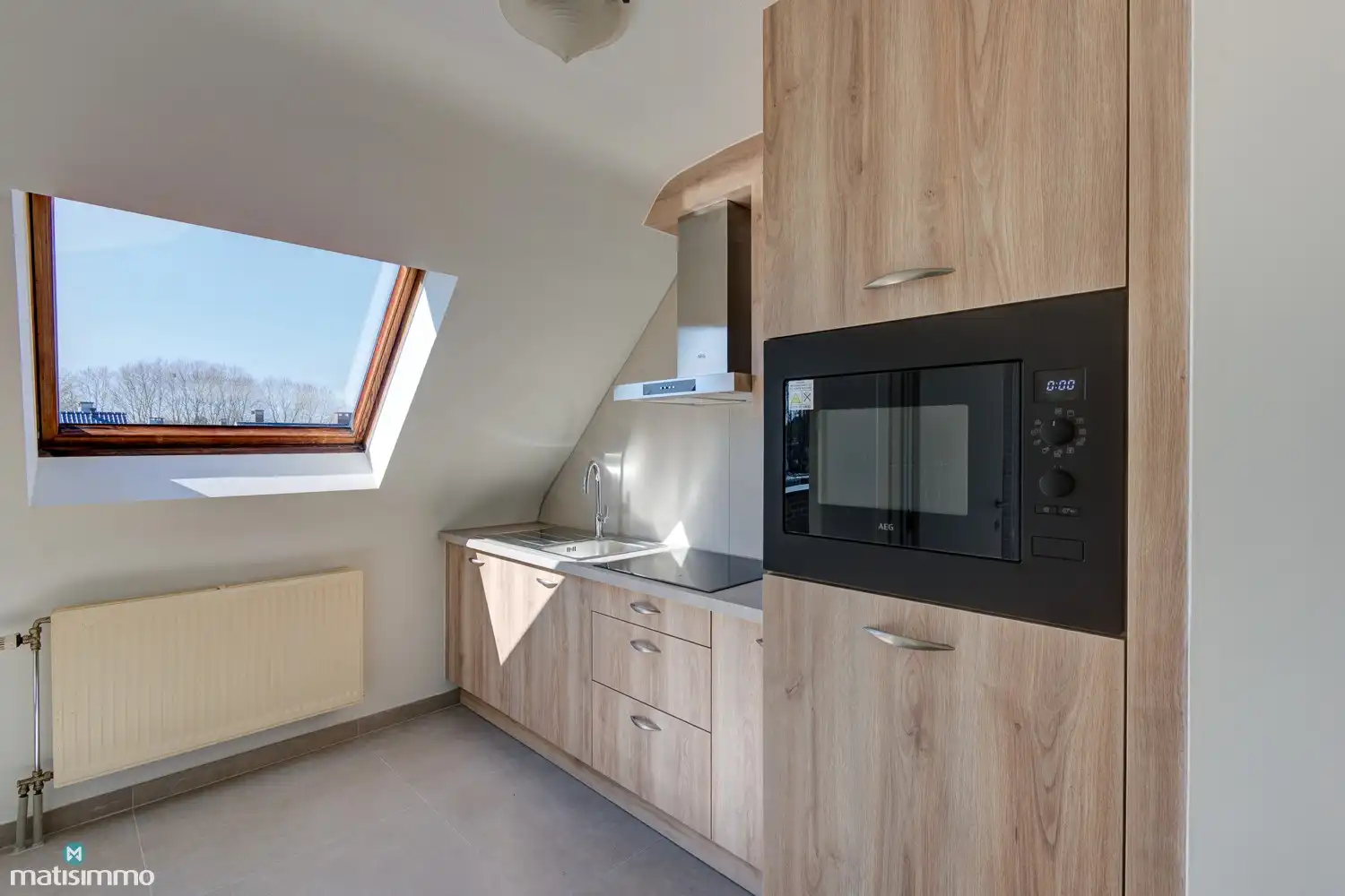 INSTAPKLAAR DUPLEX-APPARTEMENT MET 2 SLAAPKAMERS EN GARAGE NABIJ HET CENTRUM VAN BILZEN foto 5