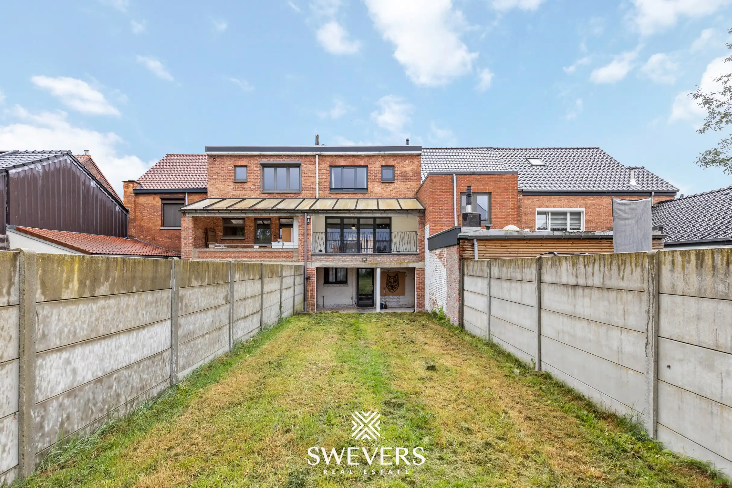 Instapklare en energiezuinige rijwoning met tuin, terras en garage in hartje Leopoldsburg foto 25