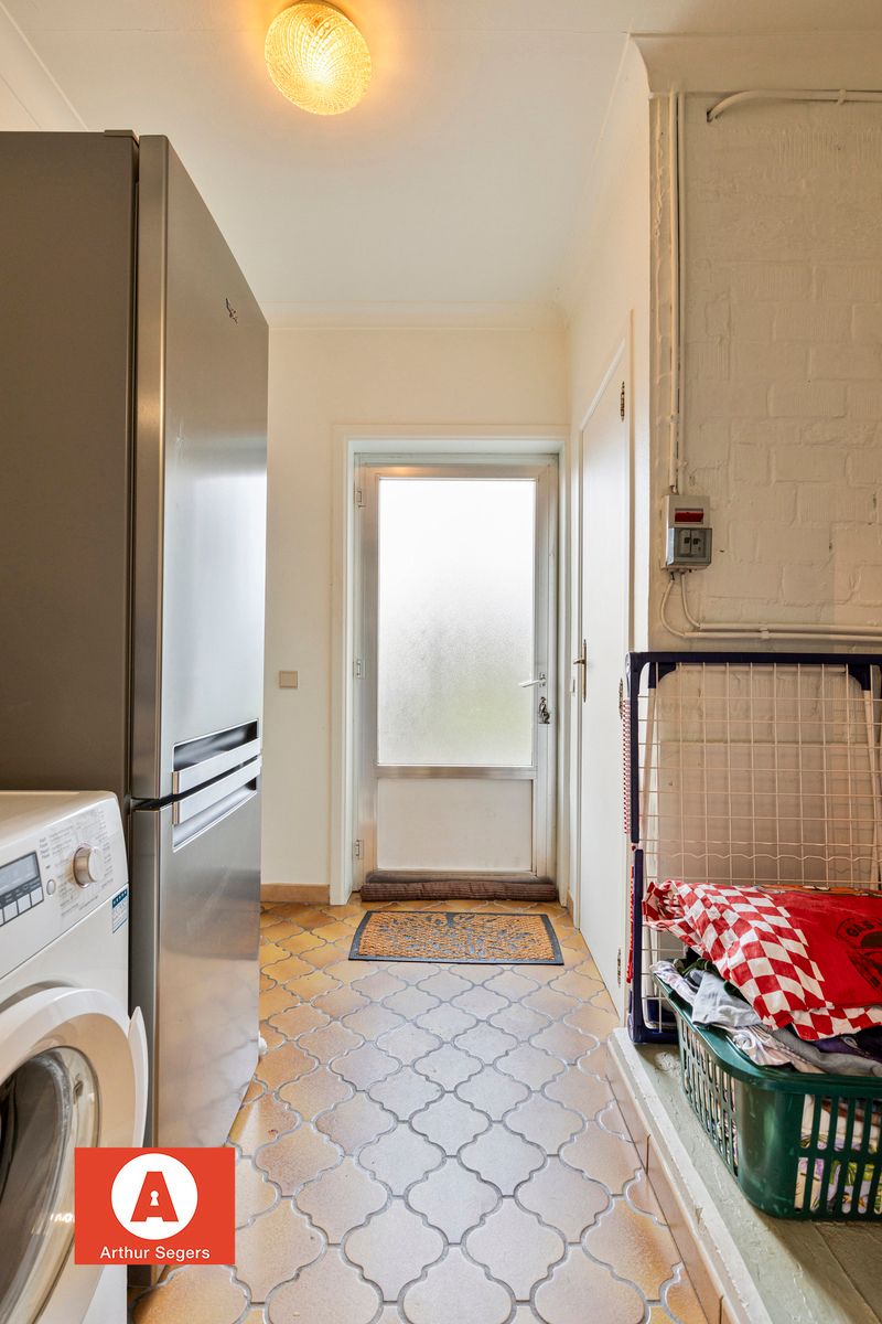 Gesloten bebouwing met 2 slaapkamers, garage én staanplaats foto 11