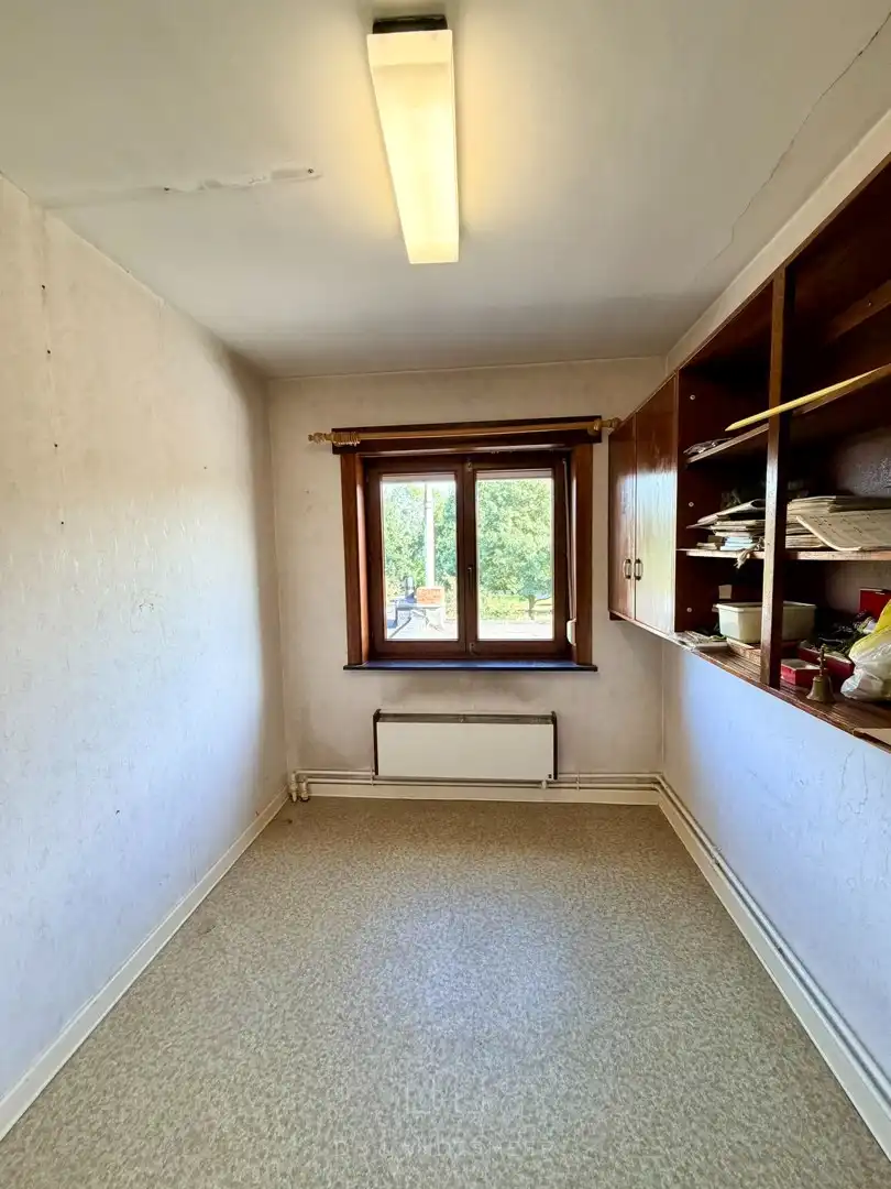 Te renoveren halfopen bebouwing met 3 slaapkamers in hartje Bornem - Een woning met potentieel! foto 18
