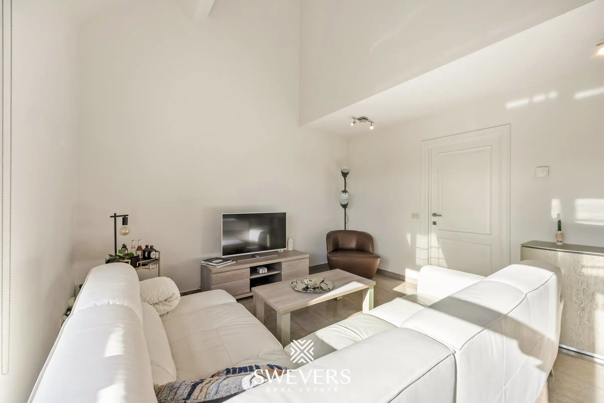 Instapklaar appartement met ondergrondse autostaanplaats en berging in het centrum foto 3